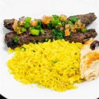 Beef Kabab · Grilled skewer of ground beef mixed with onion and parsley, dressed with pickles, tomatoes, ...