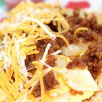 Shack Taco · A flour tortilla with eggs, chorizo, potatoes, and cheese.