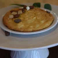 Classic Macadamia Nut Cookie · Our classic Macadamia Nut cookie can be served warm with your choice of Chocolate, Lemon, St...
