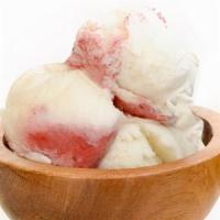 Gelato (White Chocolate Raspberry) · Soft white chocolate gelato laced with a vibrant and delicious raspberry variegate.