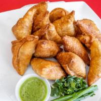 Fish Sambusa · fried pastry with a tasty fish filling.