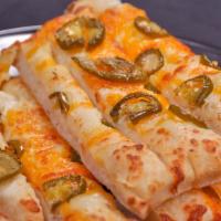 Cheesy Jalapeño Breadsticks · With jalapeño and a mixture of cheddar and mozzarella cheese. You'll love this twist on garl...
