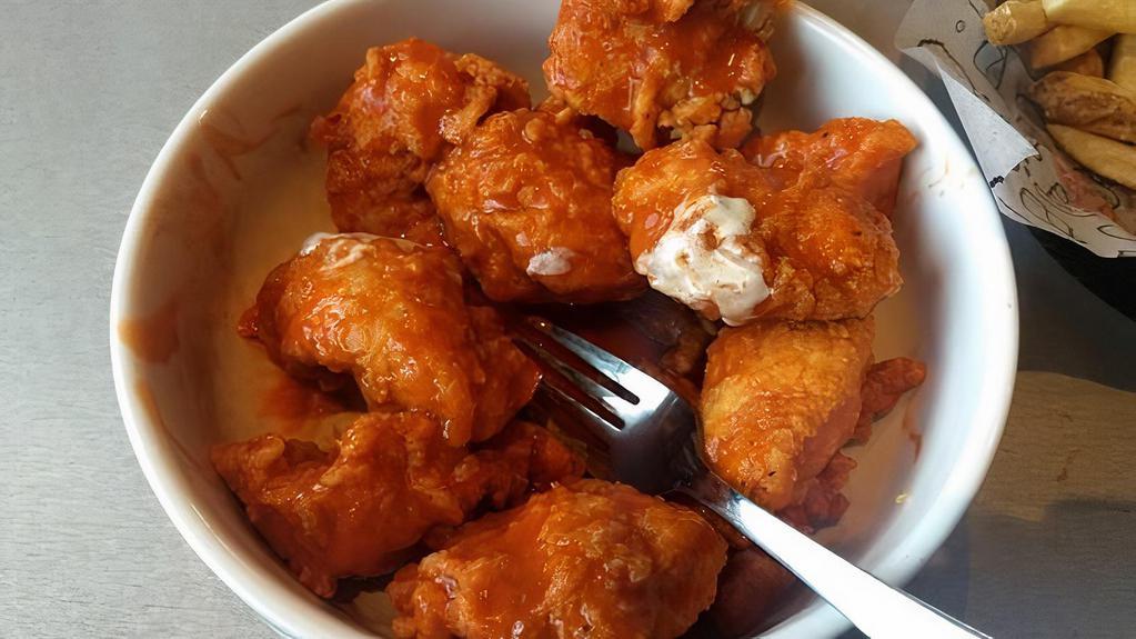 Boneless Chicken Wings · Breaded boneless Chicken Wings naked or tossed in your choice of sauce flavor. Served with your choice of dipping sauce.