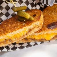 Regular Price - Via 206 · Cheddar and gouda cheese with a homemade balsamic apricot fig sauce on sourdough (vegetarian)