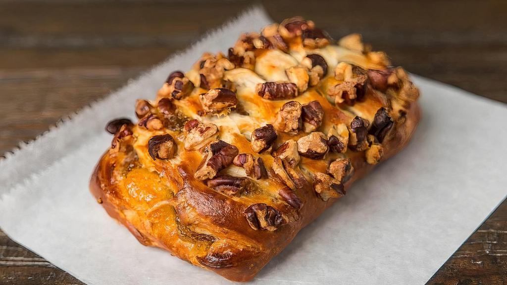 Maple Pecan Croissant · Stuffed Maple Croissant with crumbled pecan on top