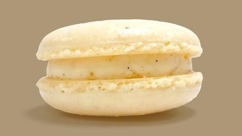 Vanilla Bean Macaron · Our fluffy buttercream is packed with vanilla bean to make this macaron exquisitely flavorful