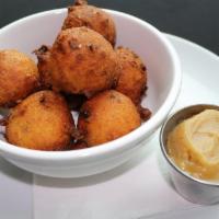 Hush Puppies · House-made and served with cane syrup butter