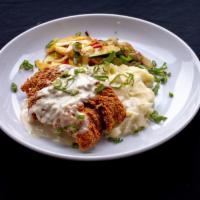 Fried Chicken & Mash · Buttermilk fried chicken breast, mashed potatoes with sausage gravy & Atkinson Farms vegetab...