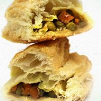 Vegetable Puff · Pastry puff filled with mixed vegetables seasoned with indian flavors.