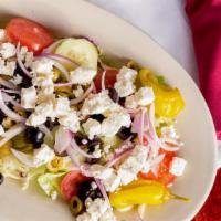 Greek Salad · Onions, olives, tomatoes, feta cheese.