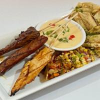 Texas Toothpicks · A grilled steak, chicken & smoked pepper sausage skewers. Served with grilled mesa panna bre...