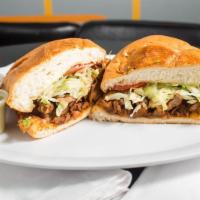Tortas · Choice of meat, lettuce, tomato, avocado, sour cream cheese and refried beans on fresh torta...