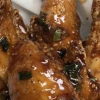 Chicken Wings · With lemon pepper, sweet chili or house sauce.