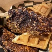 Chicken & Waffles · Fried Chicken on top of 2 Belgium Waffles, topped with Maple Syrup
