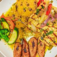 Chicken Breast · Grilled Chicken breast thinly cut and served on a bed of your choice of home-made creole sau...