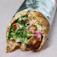 Beef Special Shawarma · Beef and falafel. Parsley, tomato, lettuce, green onion with hummus and garlic sauce.