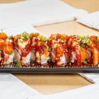 #1 Roll · Shrimp tempura snow crab inside with salmon, tuna and snow crab on top served with unagi sau...