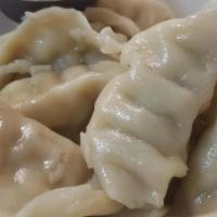 107 Fried Dumpling Or Steam Dumpling · (8)