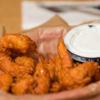 Buffalo Shrimp · Fried shrimp (8) dipped in one of our famous wing sauces served with ranch dressing.