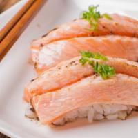 Seared Salmon Belly Sushi · Seared salmon belly