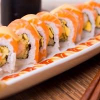 Sunshine Roll · Tempura shrimp & mango inside of the roll, topped with salmon and mango served with special ...