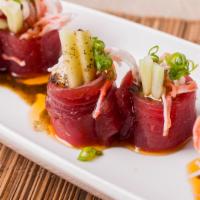 Santa Monica Roll · No rice & no seaweed. Crab meat and cucumber wrapped with tuna topped with scallions served ...