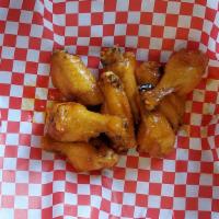 Chicken Wings / Canh Ga (8 Pieces) · Served with sauce Asian zing. Spicy or non-spicy. 8 p