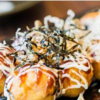 Takoyaki (5 Pcs) · Baked octopus ball with mayo and eel sauce, dried fish flakes on top.