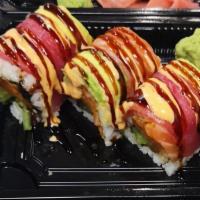 Samurai Roll · Spicy Salmon,cucumber wrapped with salmon tuna and avocado .Drizzled with eel sauce and spic...