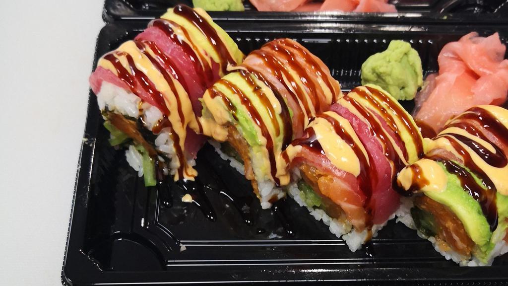 Samurai Roll · Spicy Salmon,cucumber wrapped with salmon tuna and avocado .Drizzled with eel sauce and spicy mayo.