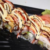 Flaming Roll · Shrimp tempura avocado cream cheese inside with imitation crab on top .Drizzled with eel sau...