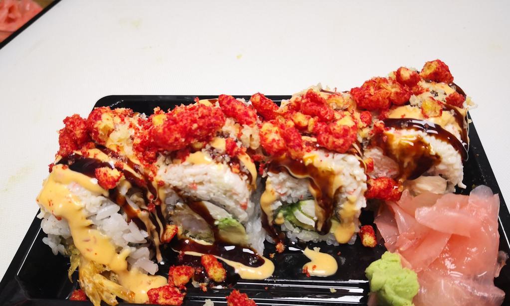 Flamin'S Hot Cheetos Roll · Shrimp Tempura with cream cheese inside top with Imitation Snow Crab hot cheetos  and eel sauce spicy mayo.