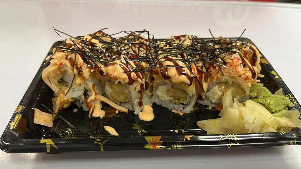 Sunset Blvd Roll · Shrimp Tempura and Cream Cheese inside ,Top with Spicy Immitation Crab and Eel Sauce Spicy Mayo Sherred Nori  Sesame Seed