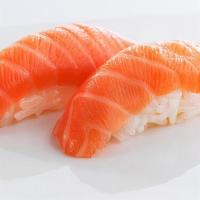 Scottish Salmon (2 Pcs) · Scottish, sushi rice topped with slices of raw fish.