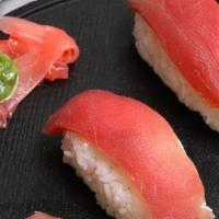 Ahi Tuna 2Pcs · Ahi Tuna ,sushi rice topped with slices of raw fish.