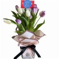 Blooming Tulips Bouquet · This bouquet 10-15  beautiful blooming tulips still in bud and blooming form in our signatur...