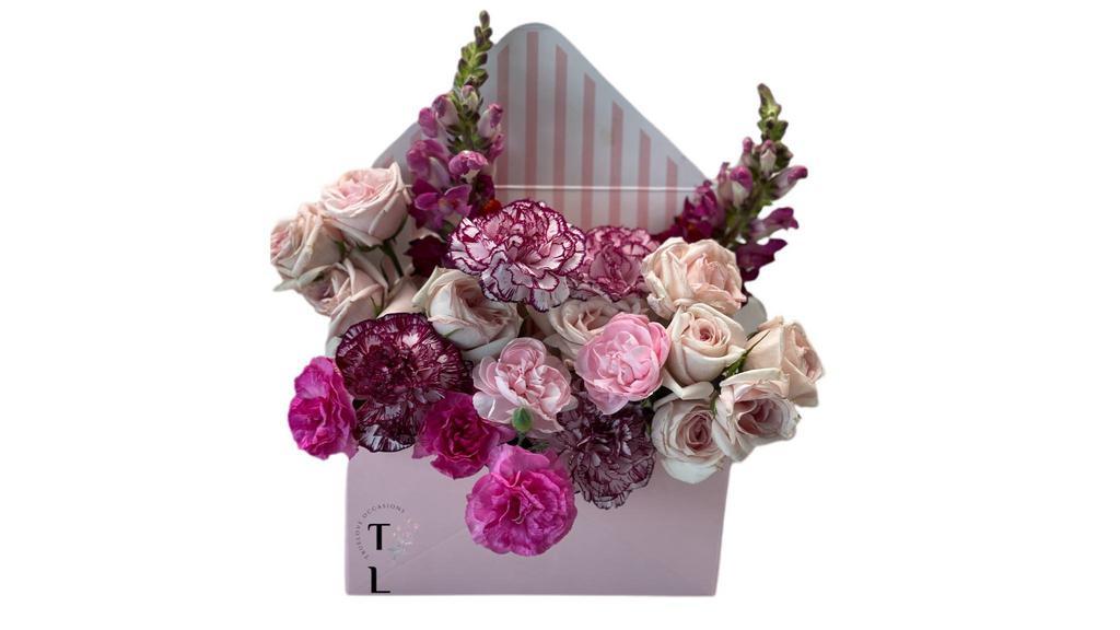Sending Love Floral Arrangement · Beautiful Fresh Flowers in an envelope box, flowers arrangement may slightly differ from picture, depending on flower availability.

Pleas specify if your would like a difffrent color.