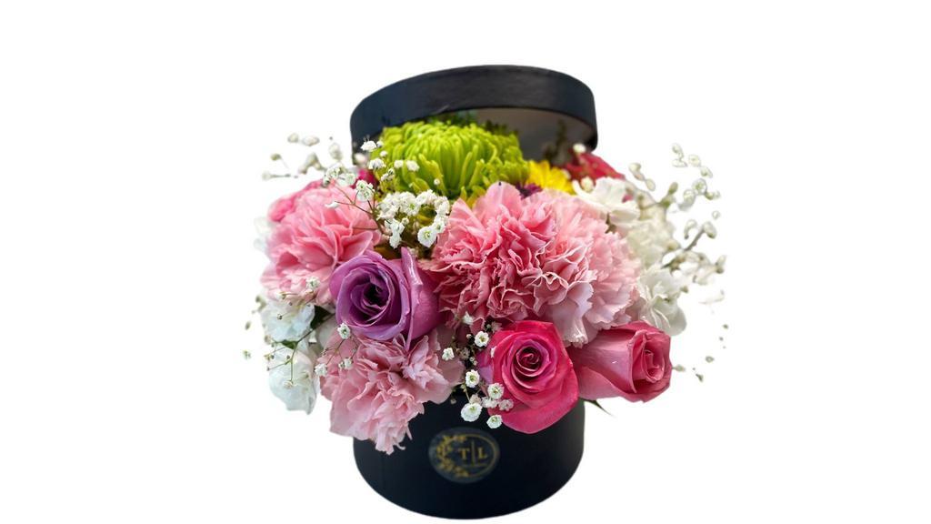 Designers Choice · Let our florists create a premium arrangment with our freshest flowers.