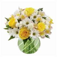 Sunny Day  · Sunny Day arrangment comes complete with yellow floral arrangement that includes roses other...