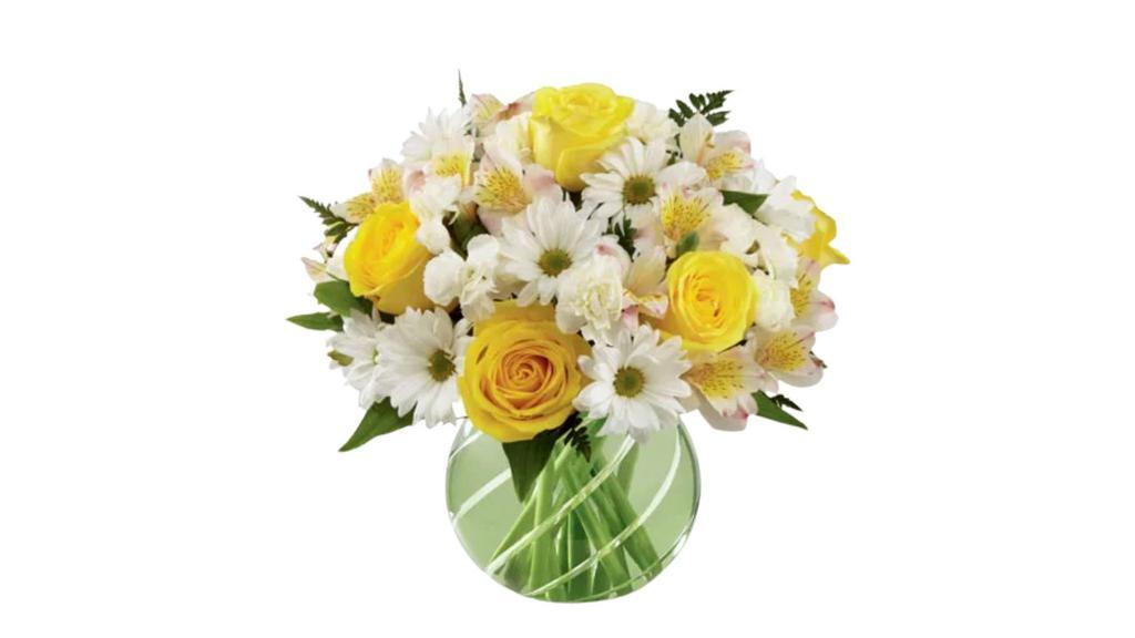 Sunny Day  · Sunny Day arrangment comes complete with yellow floral arrangement that includes roses other seasonal flowers, greenery, and filler and a glass jar.