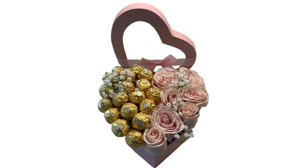Rose And Rocher Heart · 6 Beautiful Roses and Ferrero Rocher Chocolate in a signature keepsake heart box.  Can add a custom messge to the lid.