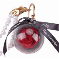 Pearl And Eternal Rose Keychain · Beautiful Eternal Rose enclosed in a globe with a pearl keycahin wristlet.