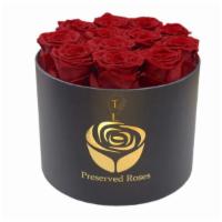 Large Round Red Eternal Roses · 12 Red Roses that has been preserved and will last up to 3-5 years.   Comes in Signature Box...