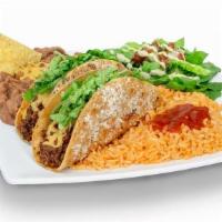 Taco Plate · Two ground beef tacos with salad, beans and rice