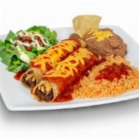 Enchilada Plate · Two ground beef enchiladas with salad, beans and rice