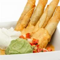 Taquito-M-G · Four ground beef or chicken taquitos with queso, sour cream, guac and pico