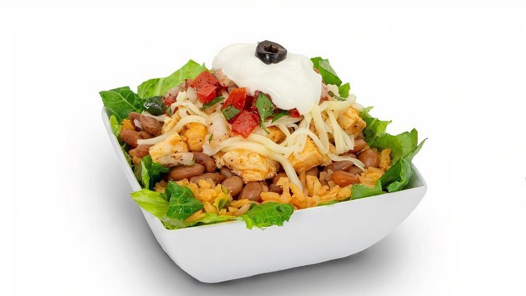 Burrito Bowl · Choice of ground beef, chicken, carnitas or steak on romaine lettuce, whole pinto beans, spanish rice, red sauce, cheese, pico and sour cream