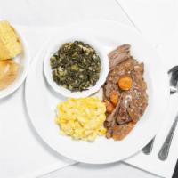 Slow Cooked Pot Roast · Served with two vegetables homemade rolls and cornbread.