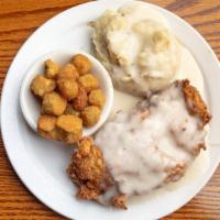 Chicken Fried Chicken · Served with two vegetables homemade rolls and cornbread.