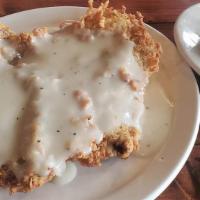 Texas Chicken Fried Steak · Served with two vegetables homemade rolls and cornbread.